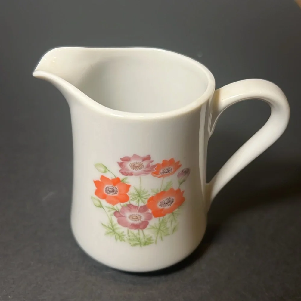 Vintage white porcelain cream‎ and sugar with floral design